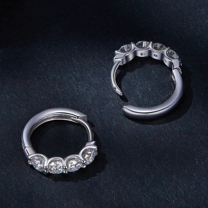 Timeless and sophisticated huggie hoop earrings with a radiant finish.