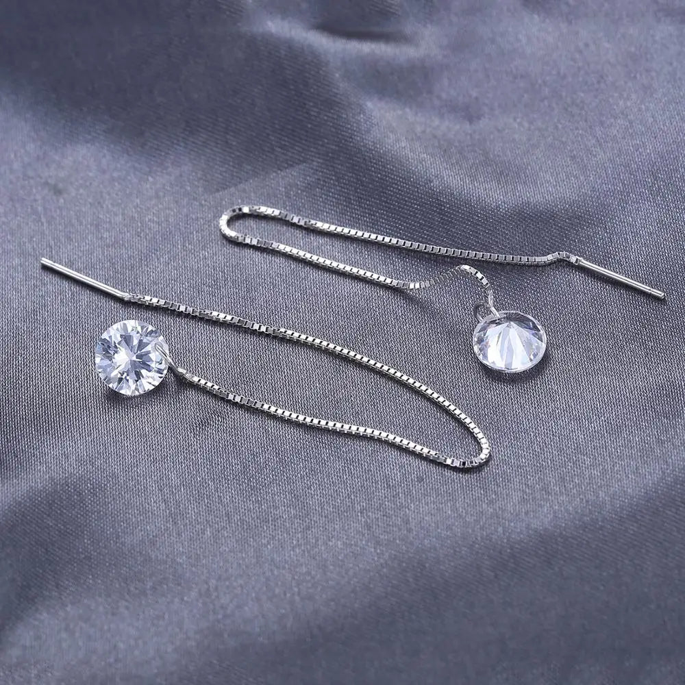 Long hanging threads silver earrings with sparkling cubic zirconia stones in white.