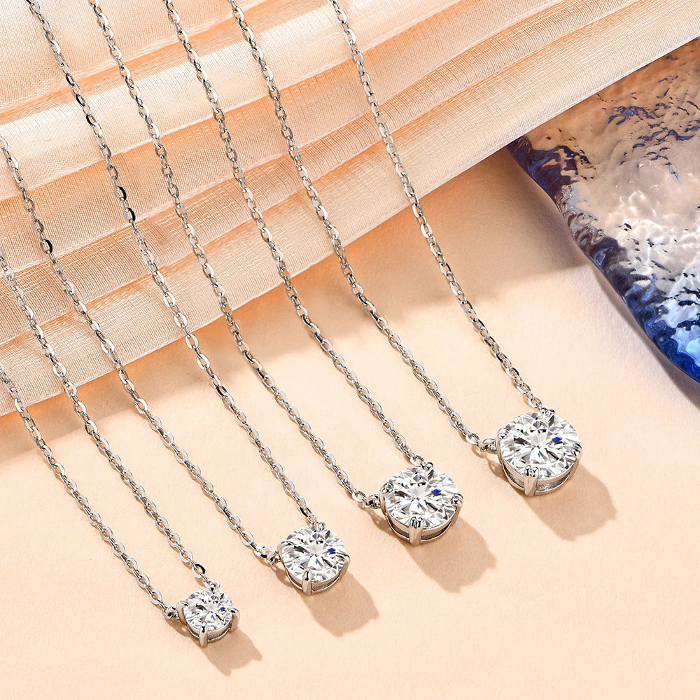 Ethereal Light Moissanite Silver Necklaces displayed in various stone sizes, showcasing the brilliance of each moissanite option.