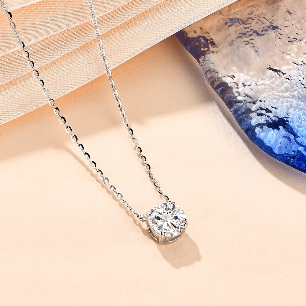 The Ethereal Light Moissanite Silver Necklace elegantly displayed, showcasing its radiant sparkle and refined design.