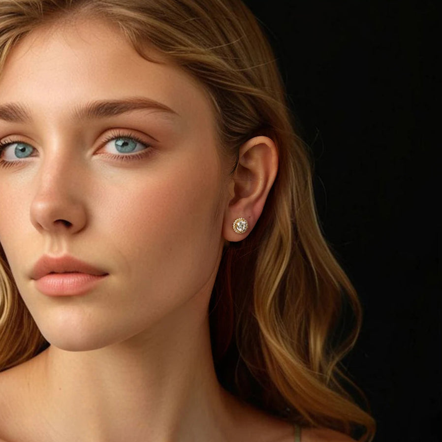 Model wearing Frosty Glow Gold-Plated Earrings, radiating timeless elegance with cubic zirconia sparkle.