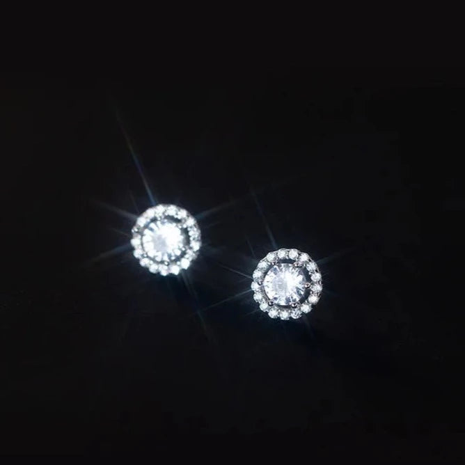 Frosty Glow Silver Earrings, displaying their exquisite craftsmanship and icy brilliance.