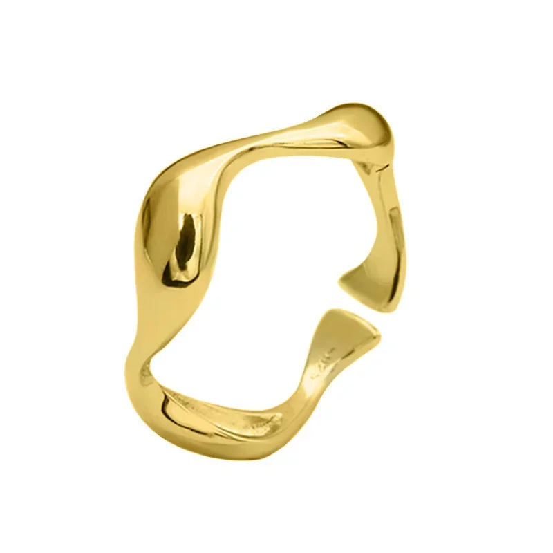 The adjustable gold-plated Golden Wave Stackable Ring, featuring a sleek and elegant wave design.