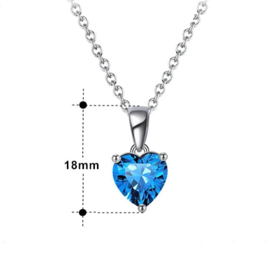 Close-up of the heart birthstone necklace with measurements displayed, showing pendant size and chain length.