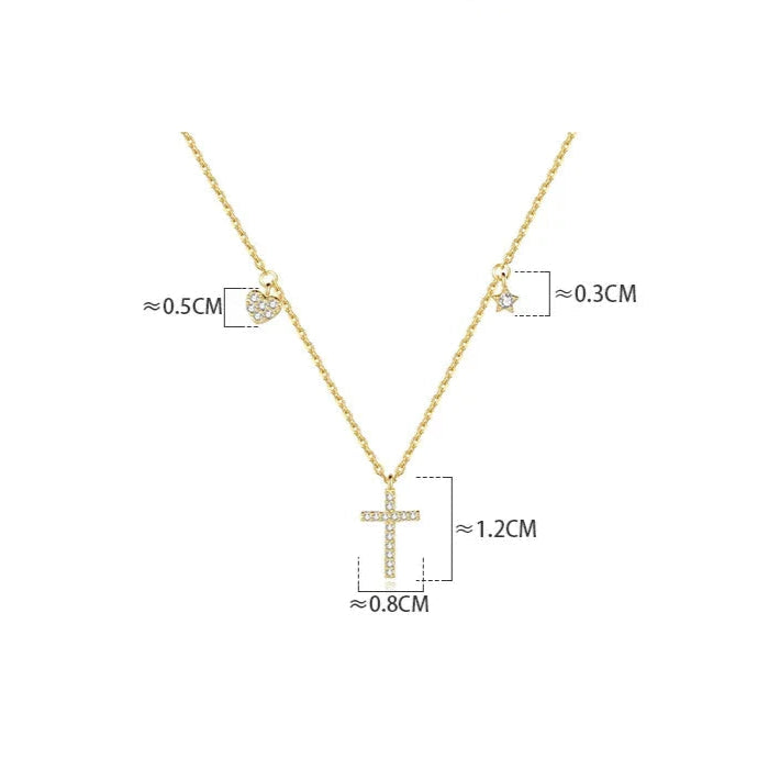 Size measurements of the Luminous Cross Necklace, showing the dimensions of the cross, heart, and star charms.