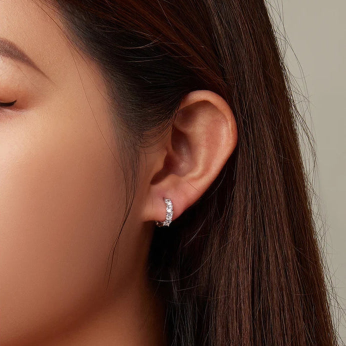 Elegant Eclipse Spark Hoops with cubic zirconia stones, ideal for formal or casual wear.