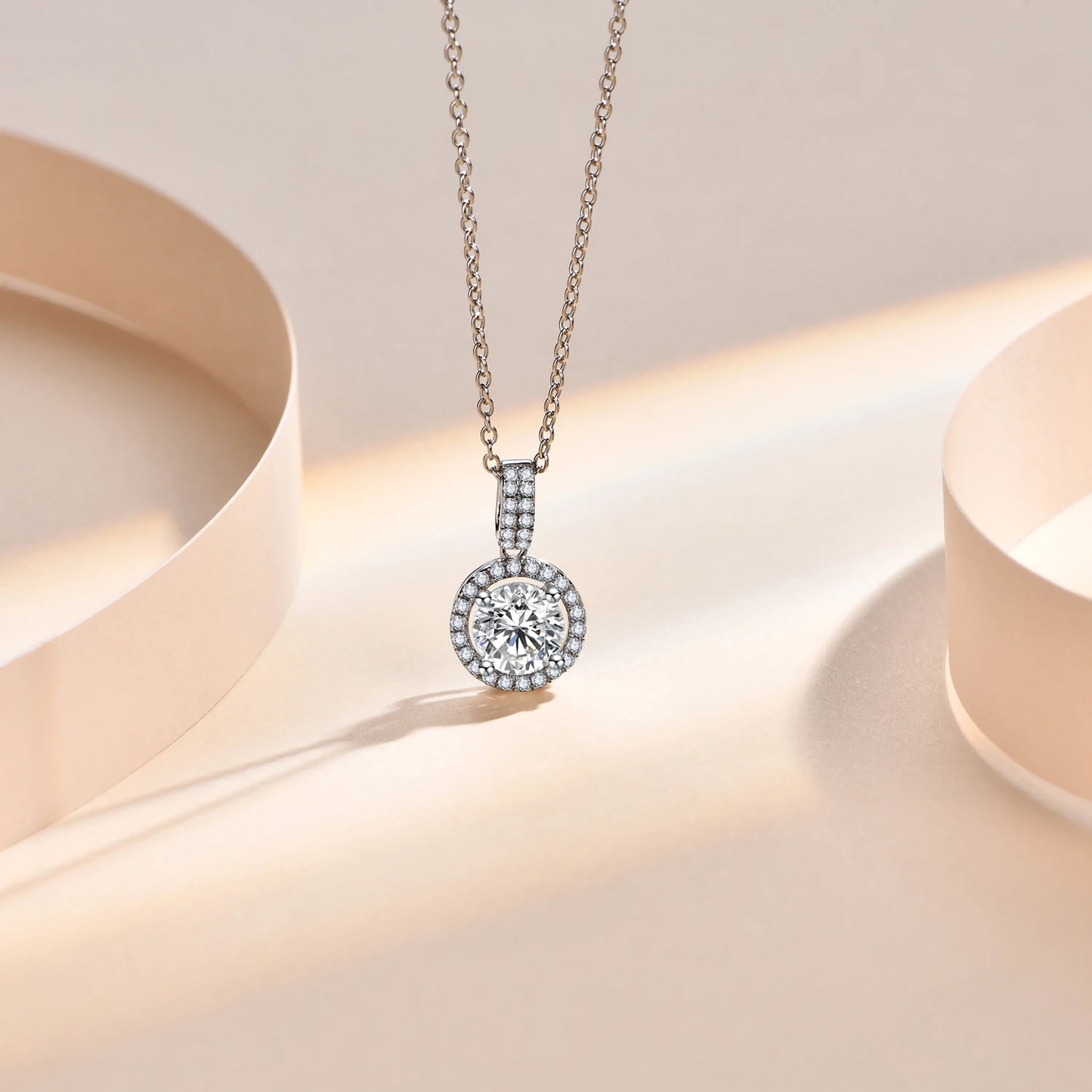 Sterling silver Celeste Halo Necklace showcasing a stunning 2-carat moissanite stone encircled by cubic zirconia.
