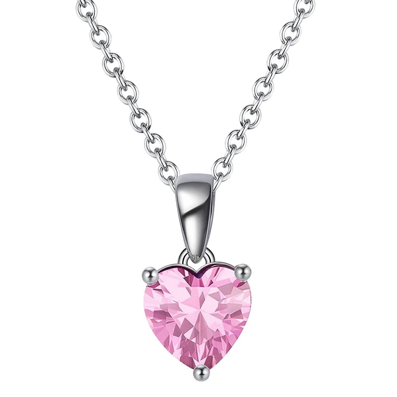 Romantic silver heart necklace with Blush Rose cubic zirconia, a soft light pink birthstone.