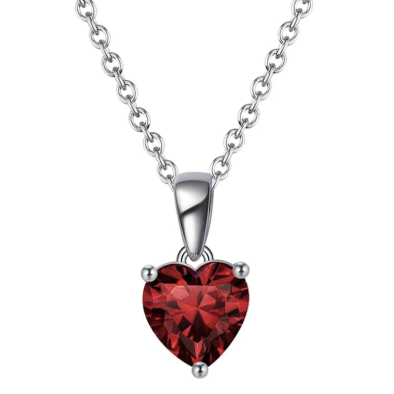 Timeless silver heart necklace adorned with a Crimson Flame cubic zirconia, a bold red gemstone.