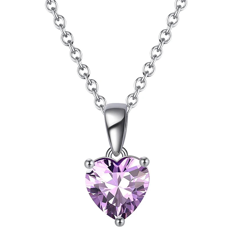 Silver heart-shaped pendant necklace with Lavender Dream cubic zirconia, a soft light violet stone.