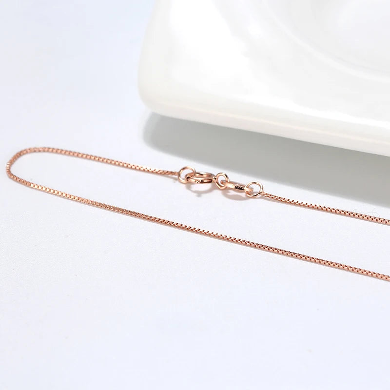 Elegant rose gold box chain, ideal for layering or wearing with pendants.