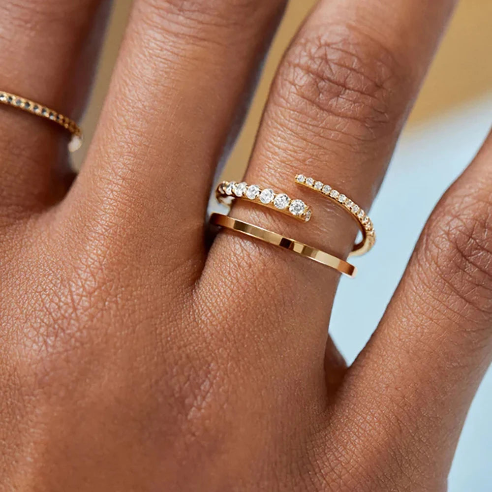 Versa-Round Silver Ring stacked with other rings, showing its versatility and layered beauty