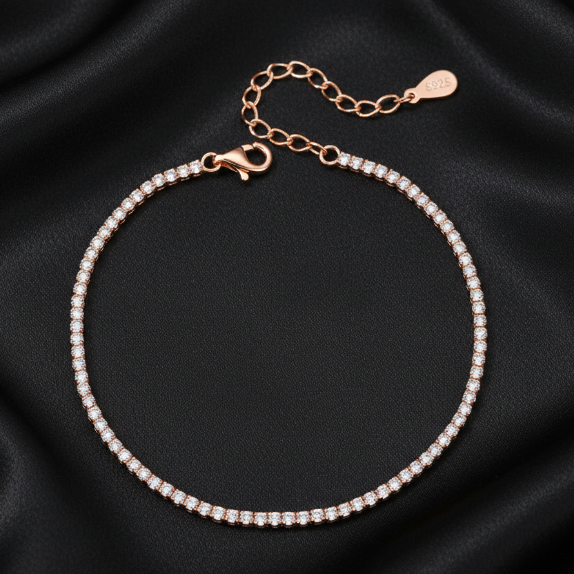 Luxury 18K rose gold plated tennis bracelet with high-clarity stones displayed on a premium black background