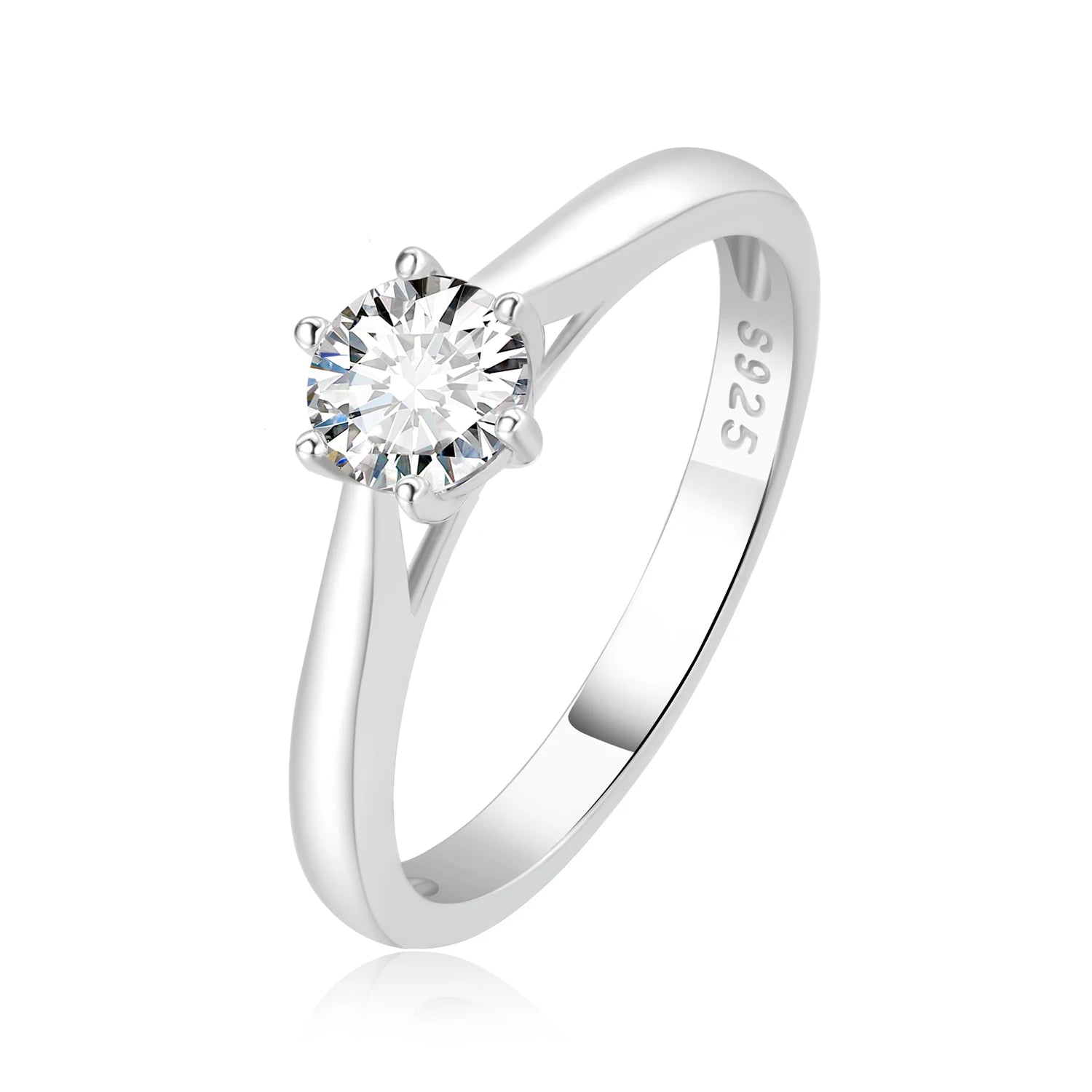 Silver ring with a small moissanite on a white background