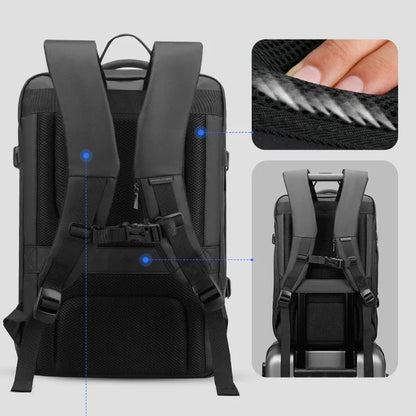 Black travel backpack with breathable mesh, USB port, and expandable design for professional and business use.