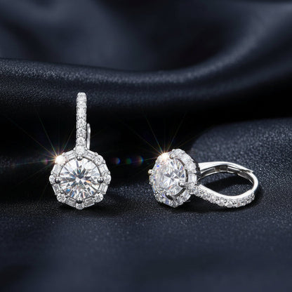 High-refraction D-Color VVS1 Moissanite earrings finished in platinum, showcasing the ultimate luxury statement