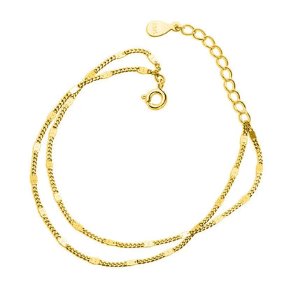 Close-up of Dual Strand Gold Plated Bracelet lobster clasp and extender chain