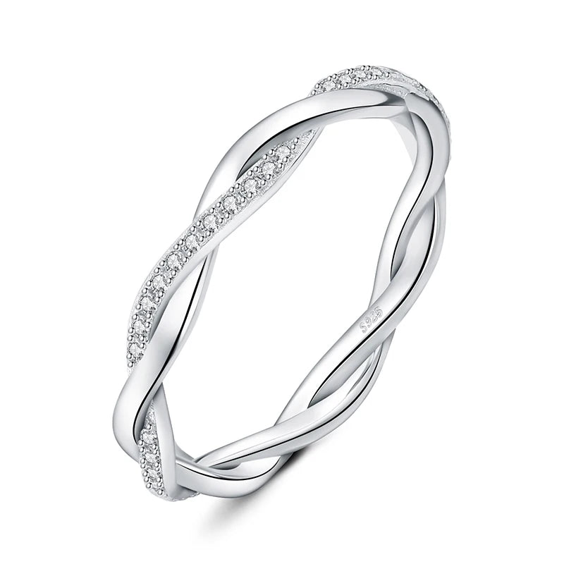 Elegant infinity cascade silver band ring with sparkling moissanite stones.