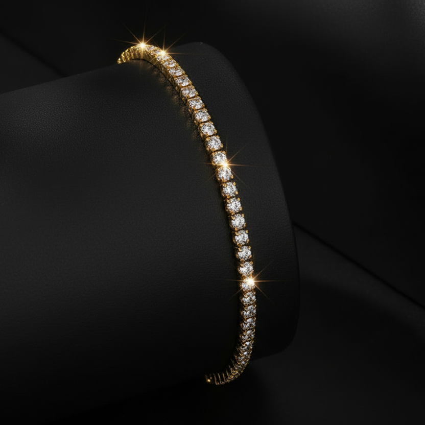 The 14K Gold Glimmer Bolero Bracelet displayed on the black cone, highlighting the radiant glow