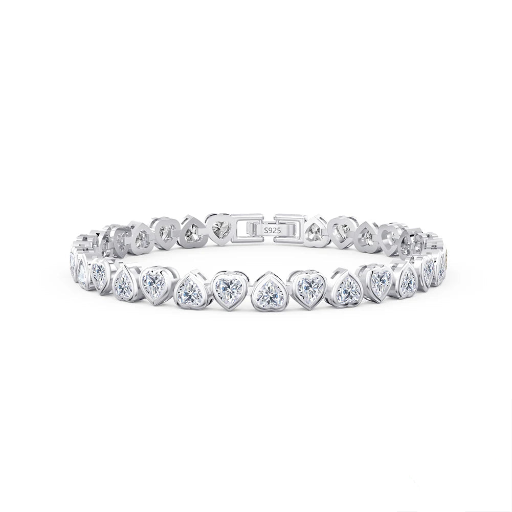 Elegant silver heart-cut tennis bracelet featuring cubic zirconia stones in a timeless design.