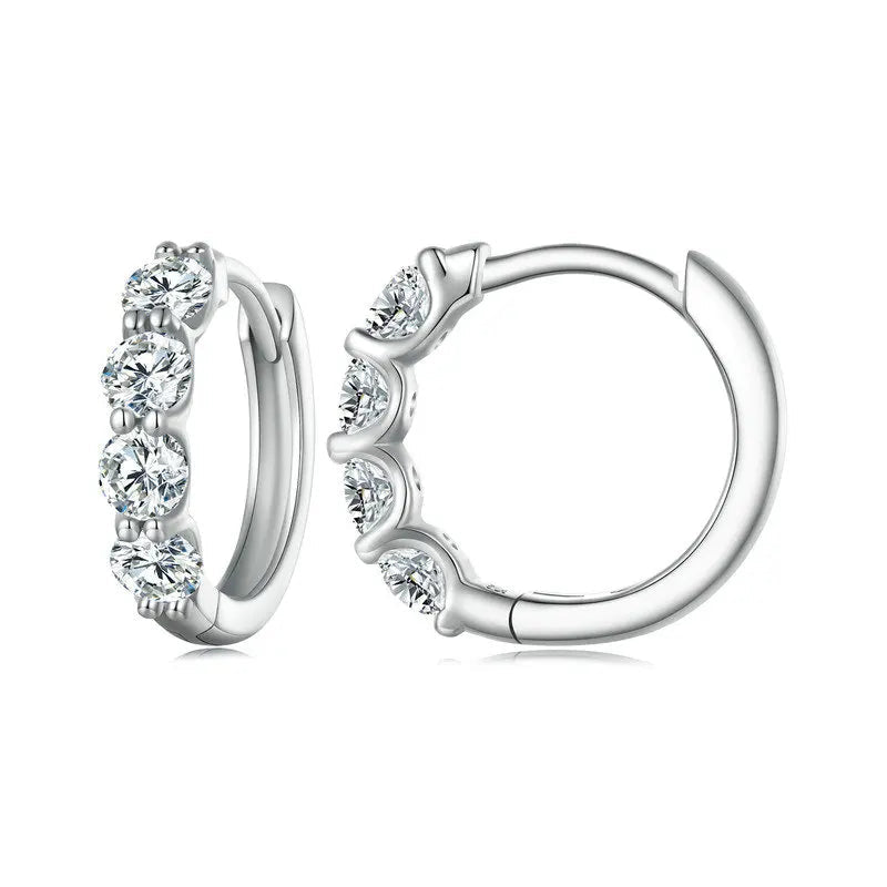 Luminous Glow Huggie Hoops crafted from 925 sterling silver with sparkling moissanite stones.