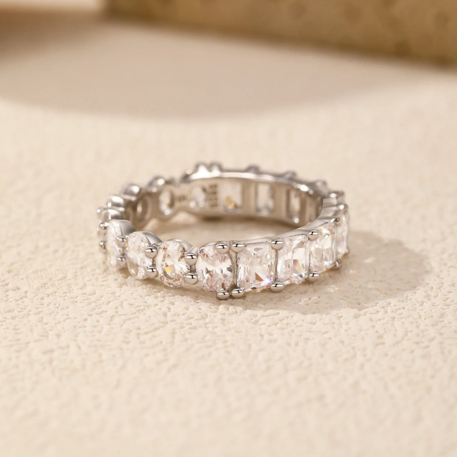 Single Luna ring in sterling silver with sparkling cubic zirconia, highlighting its elegant and timeless design.