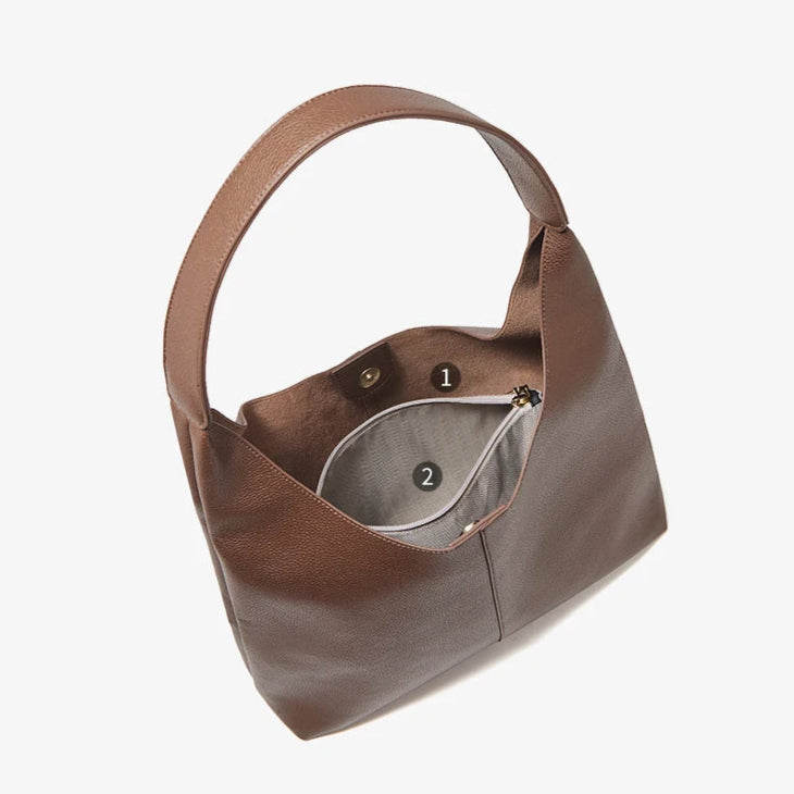 Soft leather bag with urban appeal and versatile functionality.