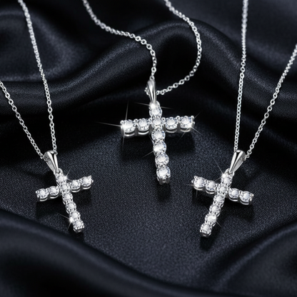 The Signature Cross on black silk, demonstrating the elegant proportions and scale of the pendant
