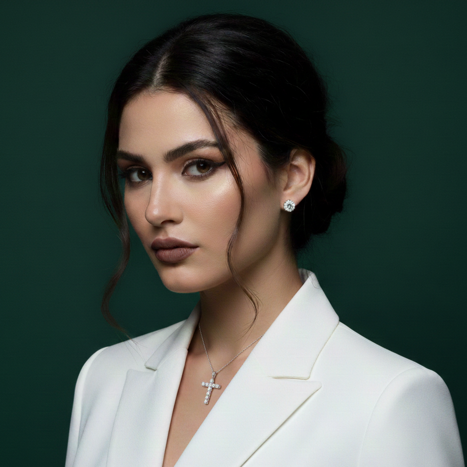 Lifestyle view of a model wearing the Silver Moissanite Cross pendant, capturing a sophisticated, everyday luxury look