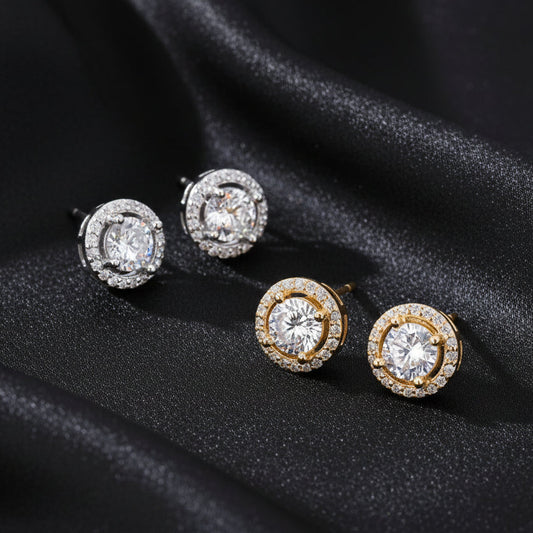The Pure Halo Studs resting on draped black silk to emphasize the 925 silver luster and stone clarity