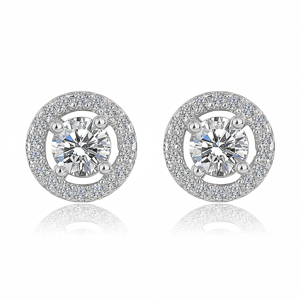 A pair of Pure Halo Studs in 925 sterling silver featuring a brilliant round-cut center stone