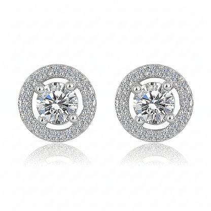 A pair of Pure Halo Studs in 925 sterling silver featuring a brilliant round-cut center stone