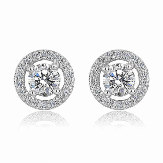 A pair of Pure Halo Studs in 925 sterling silver featuring a brilliant round-cut center stone