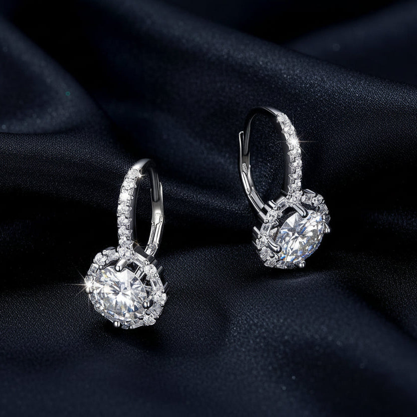 Side profile of Versailles moissanite earrings highlighting the secure European leverback closure and platinum-finished silver setting