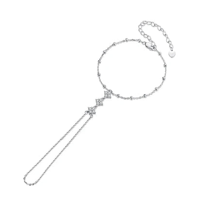 Silver bracelet with a ring chain and decorative clasp on a white background