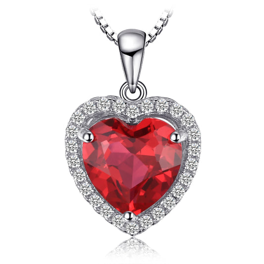 Signature Ruby Love Pendant featuring a heart-shaped lab-grown ruby surrounded by sparkling cubic zirconia.