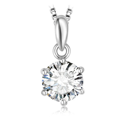 Silver pendant with a large clear gemstone on a white background